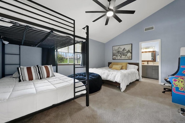 carpeted bedroom with high vaulted ceiling, ceiling fan, and connected bathroom