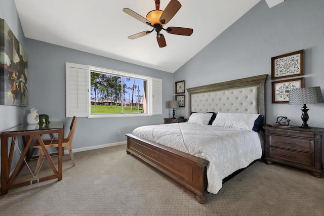 carpeted bedroom featuring ceiling fan and vaulted ceiling