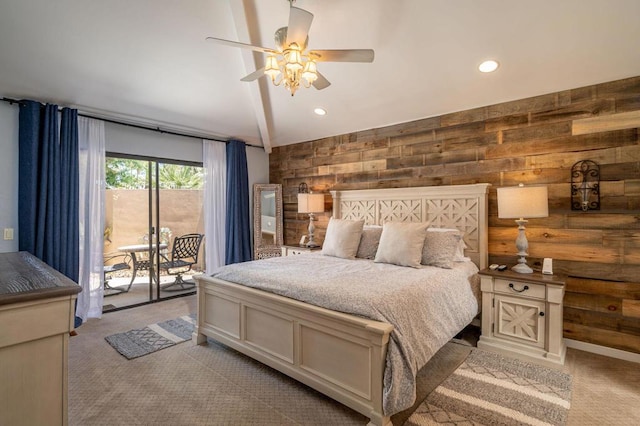 bedroom with access to outside, ceiling fan, wooden walls, and light colored carpet