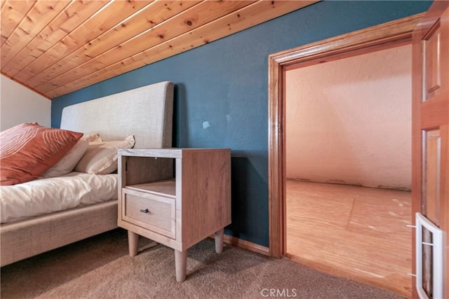 living area with hardwood / wood-style floors, wooden ceiling, and lofted ceiling