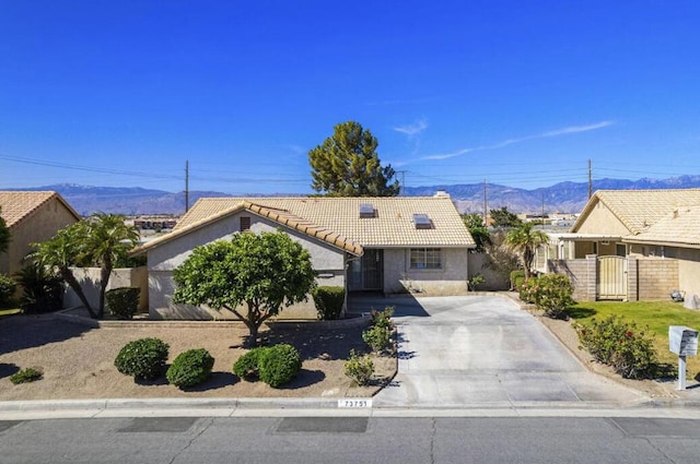 single story home with a mountain view