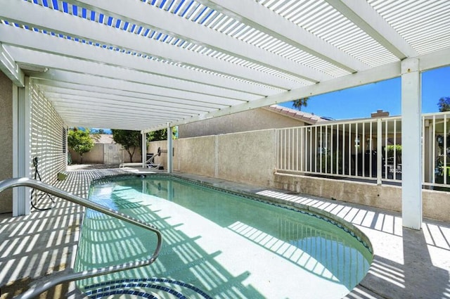 view of swimming pool featuring a patio area and a pergola