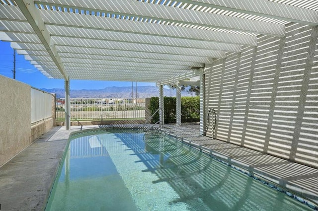 view of pool featuring a mountain view