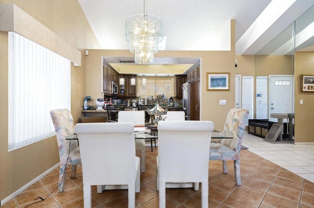 dining space with light tile patterned floors