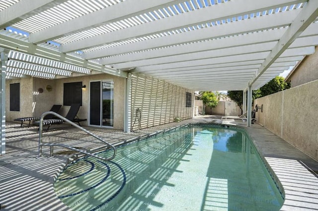 view of pool featuring a pergola and a patio area