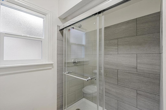 bathroom featuring an enclosed shower