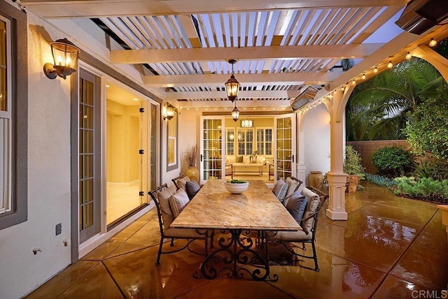 view of patio with french doors and a pergola