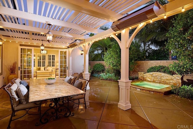 view of patio with a pergola and an in ground hot tub