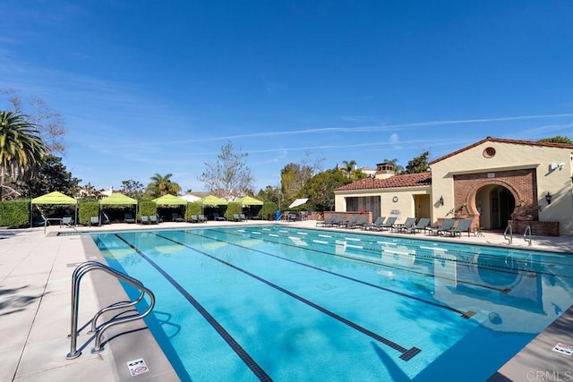 pool with a patio area