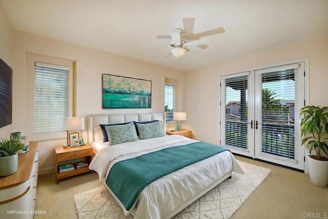 carpeted bedroom featuring a ceiling fan, access to outside, french doors, and baseboards