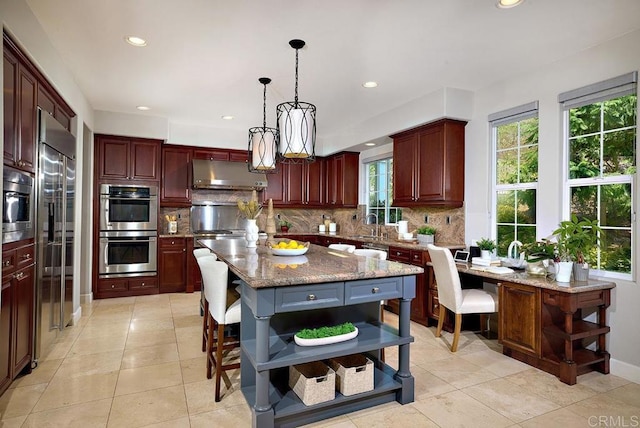 kitchen with double oven, backsplash, under cabinet range hood, and open shelves