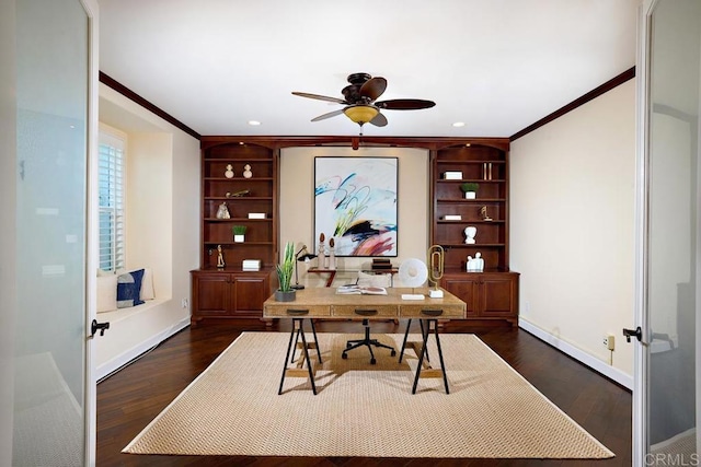 office featuring ceiling fan, ornamental molding, and dark wood-style flooring