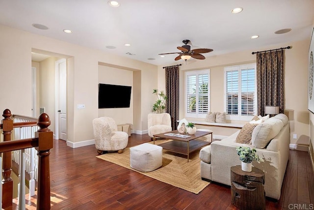 living room with visible vents, baseboards, a ceiling fan, wood-type flooring, and recessed lighting