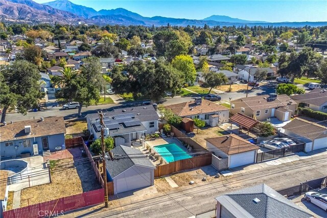 birds eye view of property featuring a mountain view