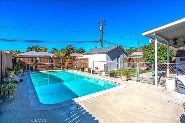 view of swimming pool featuring a patio