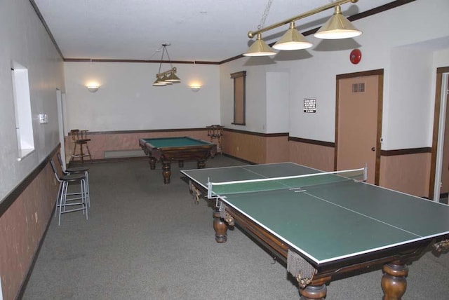 playroom with billiards, ornamental molding, and carpet flooring