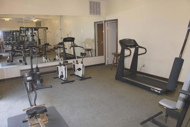 exercise room with ceiling fan