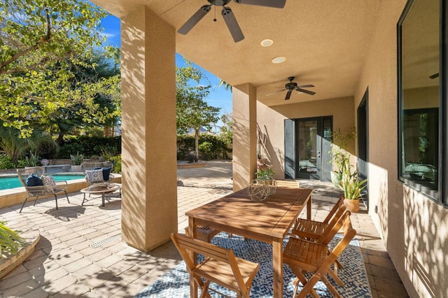 view of patio with ceiling fan