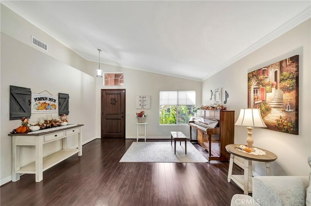 interior space with crown molding, dark hardwood / wood-style flooring, and vaulted ceiling