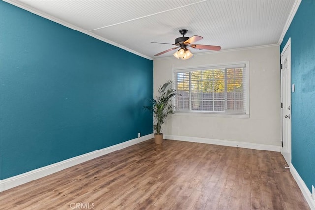 spare room featuring crown molding, ceiling fan, and hardwood / wood-style flooring