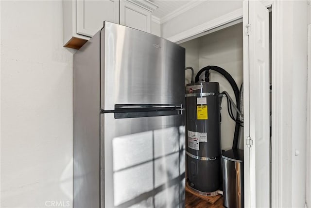 utility room featuring water heater