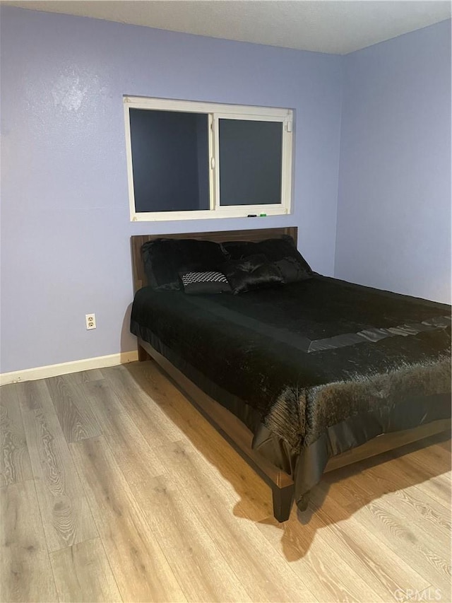 bedroom featuring light hardwood / wood-style flooring