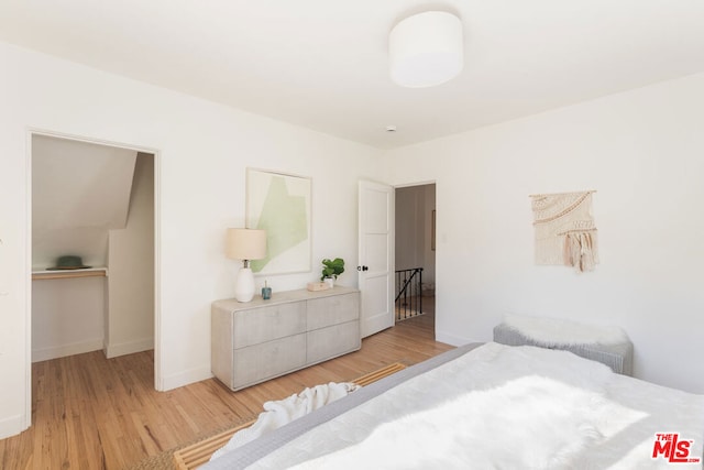 bedroom featuring light hardwood / wood-style floors