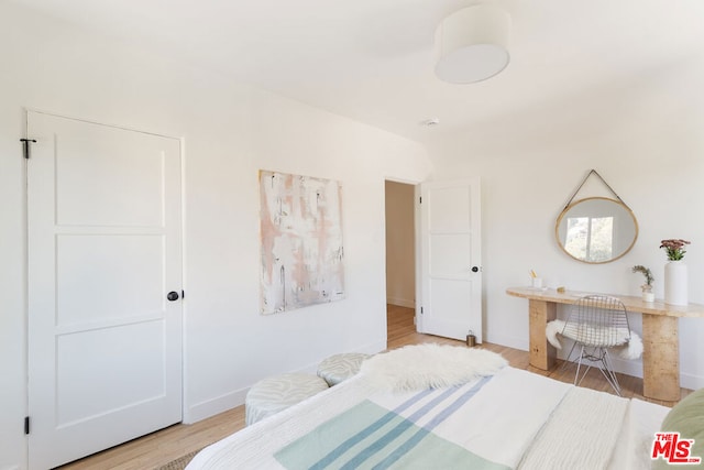 bedroom featuring light hardwood / wood-style floors