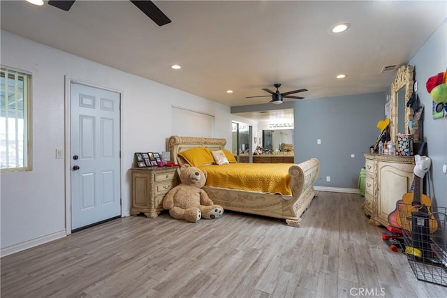 bedroom featuring light wood-type flooring