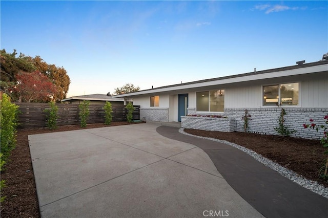 view of front of property featuring a patio