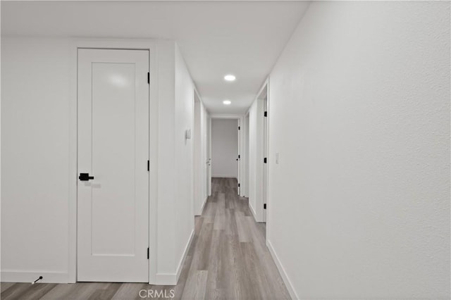 corridor featuring light wood-type flooring