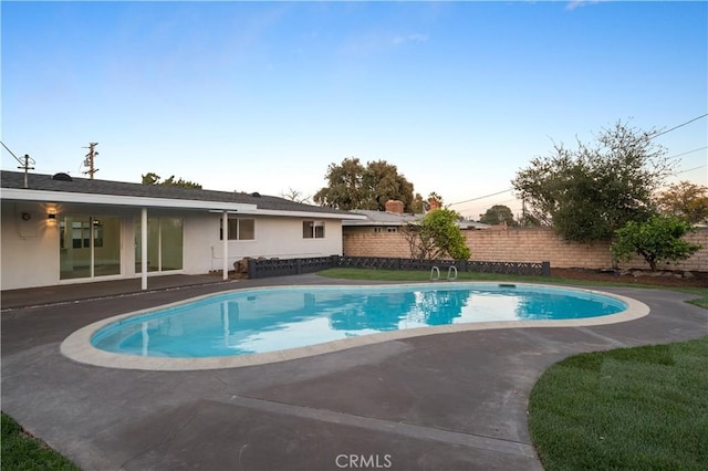 view of pool featuring a patio area