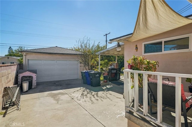 view of home's exterior with an outbuilding and a garage