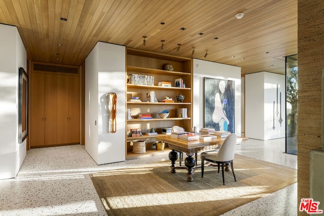 dining area with wooden ceiling