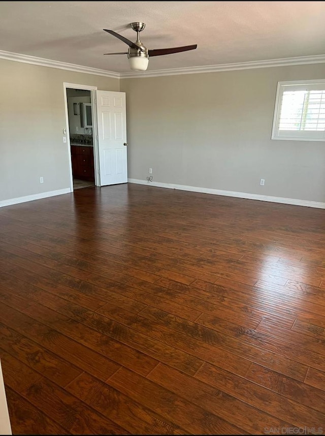 unfurnished room with ceiling fan, dark hardwood / wood-style floors, and ornamental molding