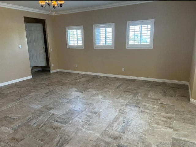 unfurnished room featuring crown molding