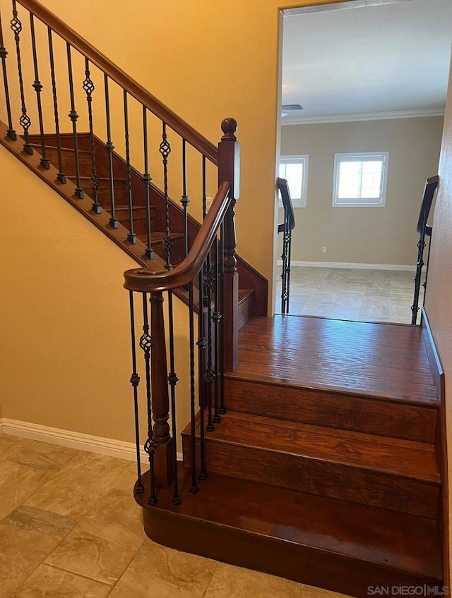 stairs with crown molding