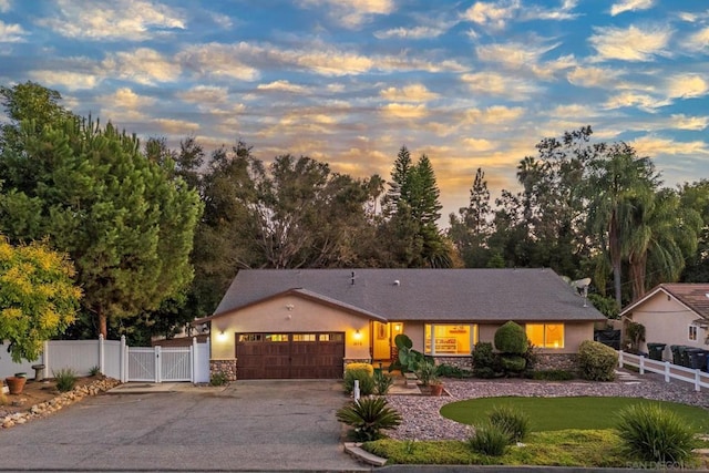 ranch-style home with a garage