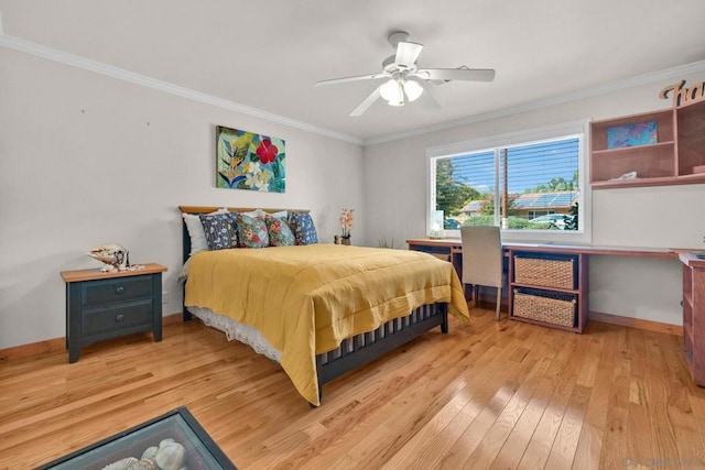 bedroom featuring ceiling fan, crown molding, and light wood-type flooring