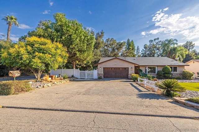 single story home with a garage