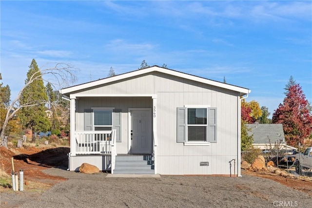 view of front of property featuring covered porch