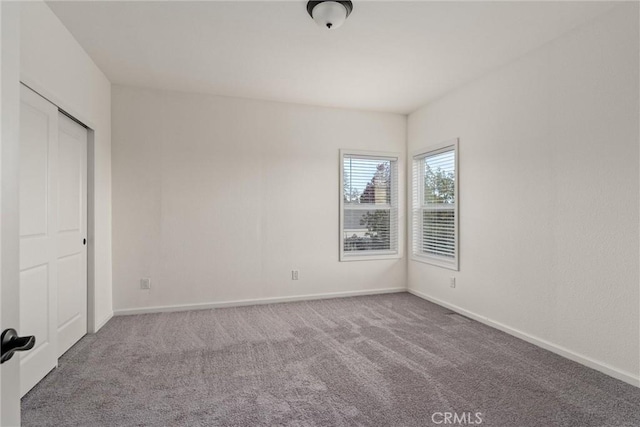 unfurnished bedroom featuring carpet