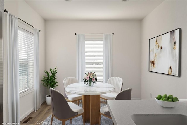 dining area featuring light hardwood / wood-style flooring