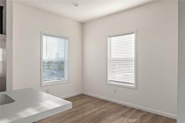 interior space with hardwood / wood-style floors