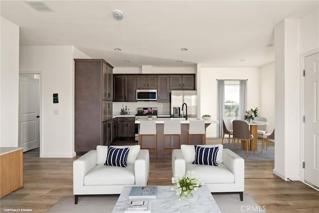 living room with hardwood / wood-style floors