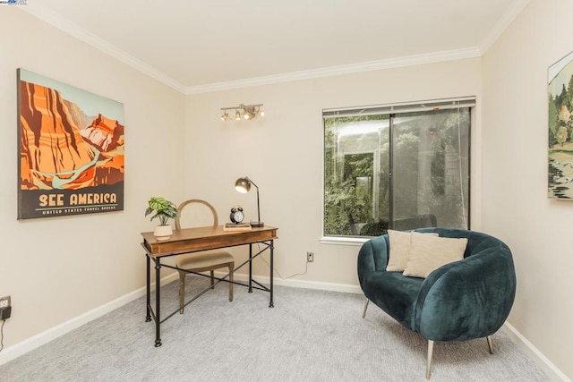 sitting room with crown molding and light colored carpet