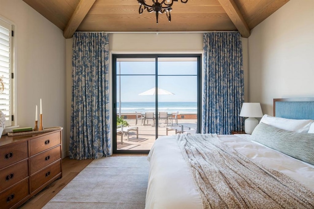 bedroom with wooden ceiling, lofted ceiling with beams, a water view, light hardwood / wood-style flooring, and access to exterior