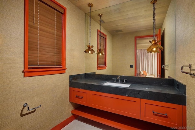 bathroom with vanity and wooden ceiling