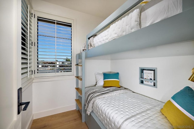 bedroom featuring hardwood / wood-style floors