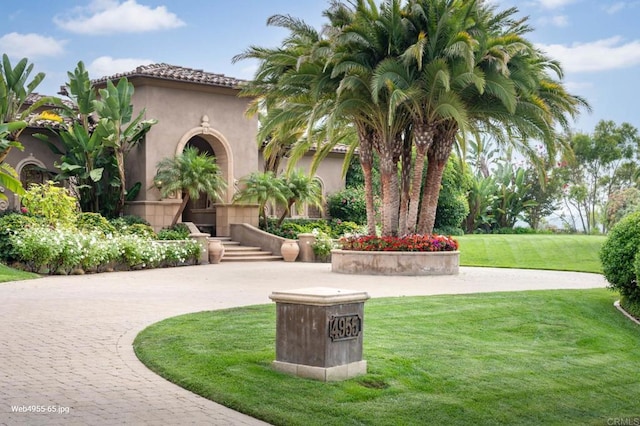 exterior space featuring a front yard